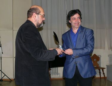 A díjat átveszi Kósa András. A szerző felvétele